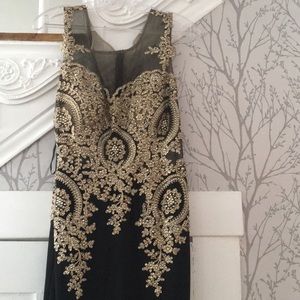 Worn once beautiful black and gold prom dress
